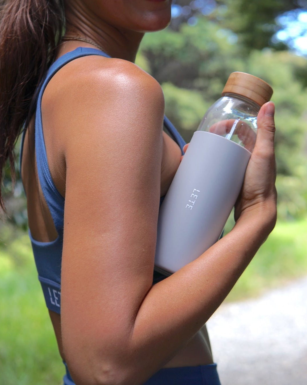 Lete Activewear holding sustainable bottle